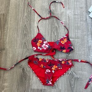 Hollister floral bikini top wrap and bottoms. Both size S.